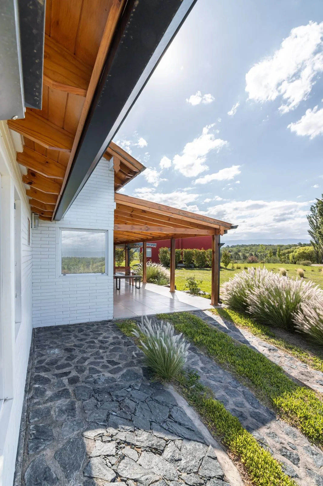 Upward view of roof eaves and timber patio